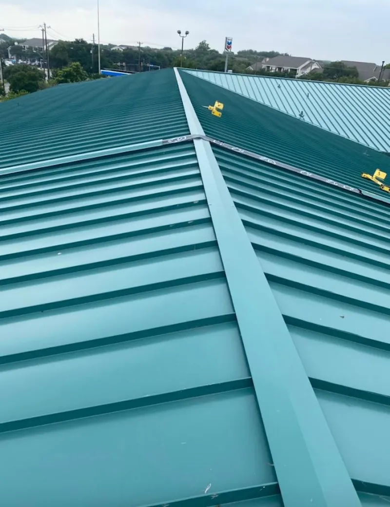 Green commercial metal roof ridge and valley for Metal Roof Repair in Oxford